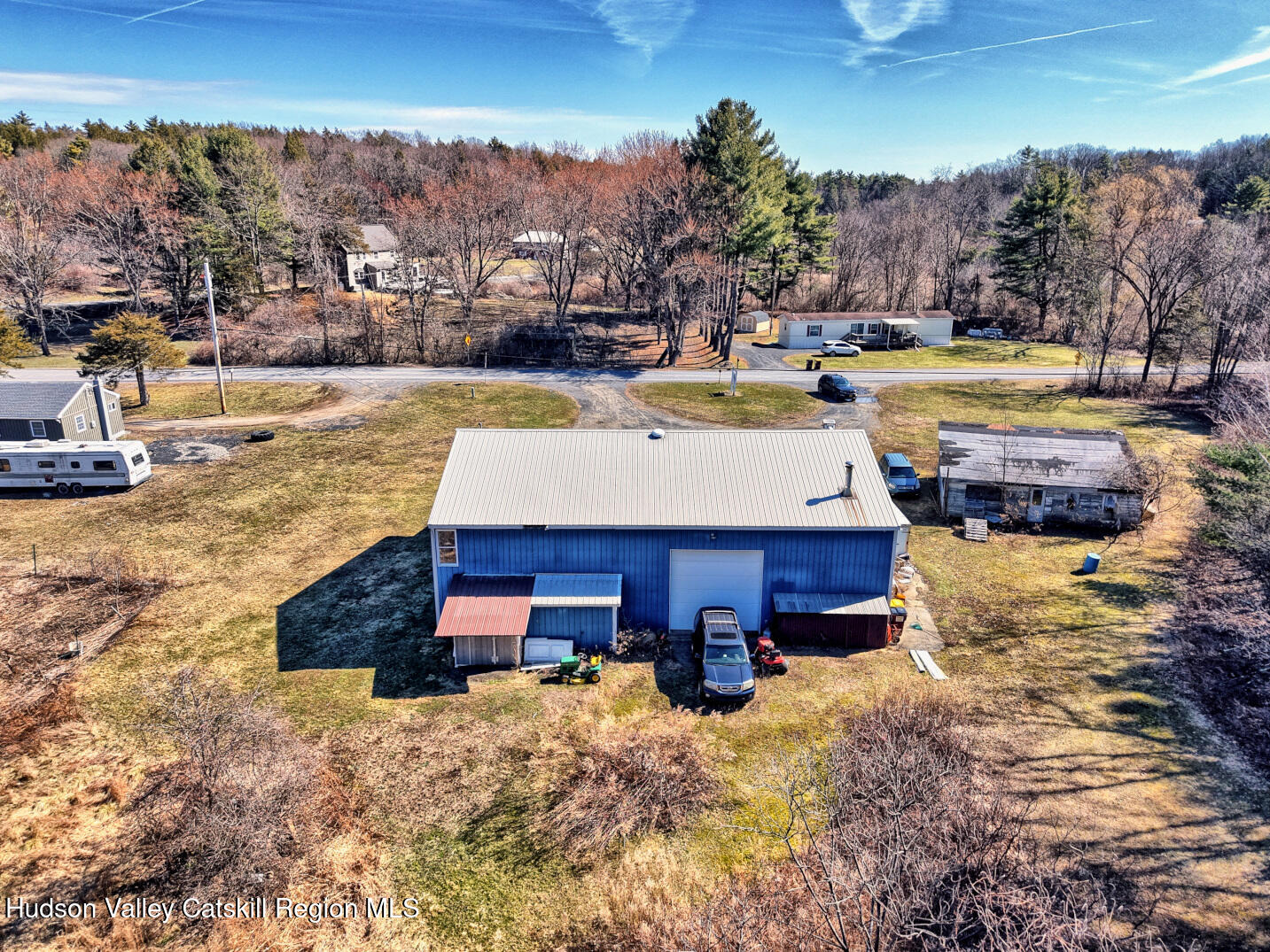 301 Sugar Loaf Road Earlton, NY 12058 - Photo 5 of 64 a view of a swimming pool with an outdoor space and seating area