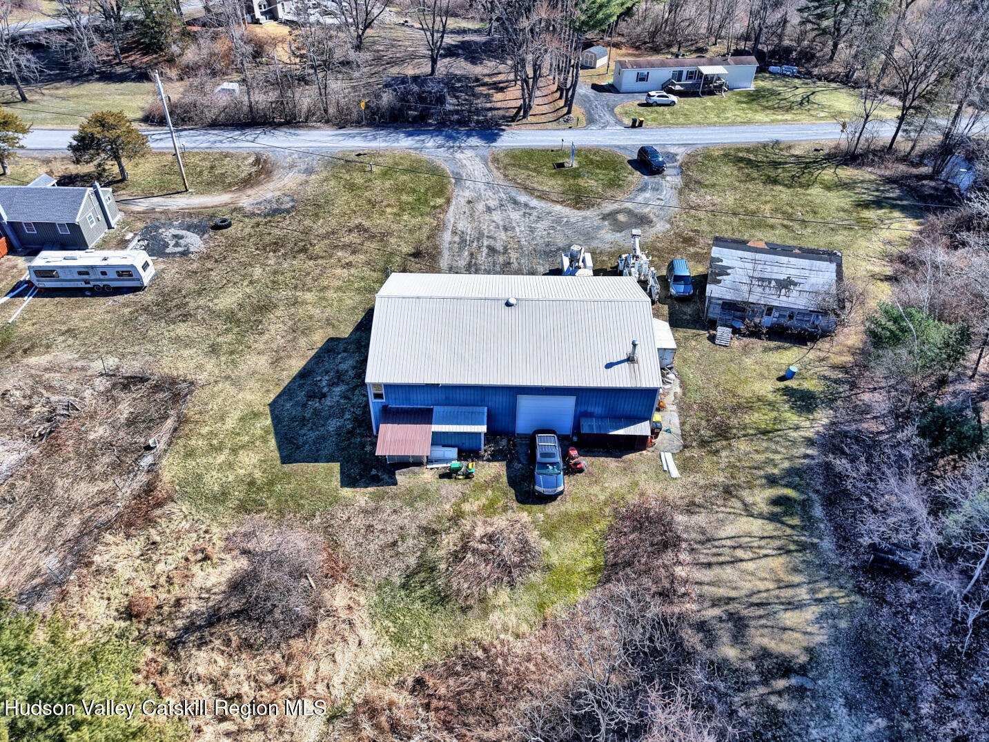 301 Sugar Loaf Road Earlton, NY 12058 - Photo 54 of 64 a view of a house with a yard and sitting area