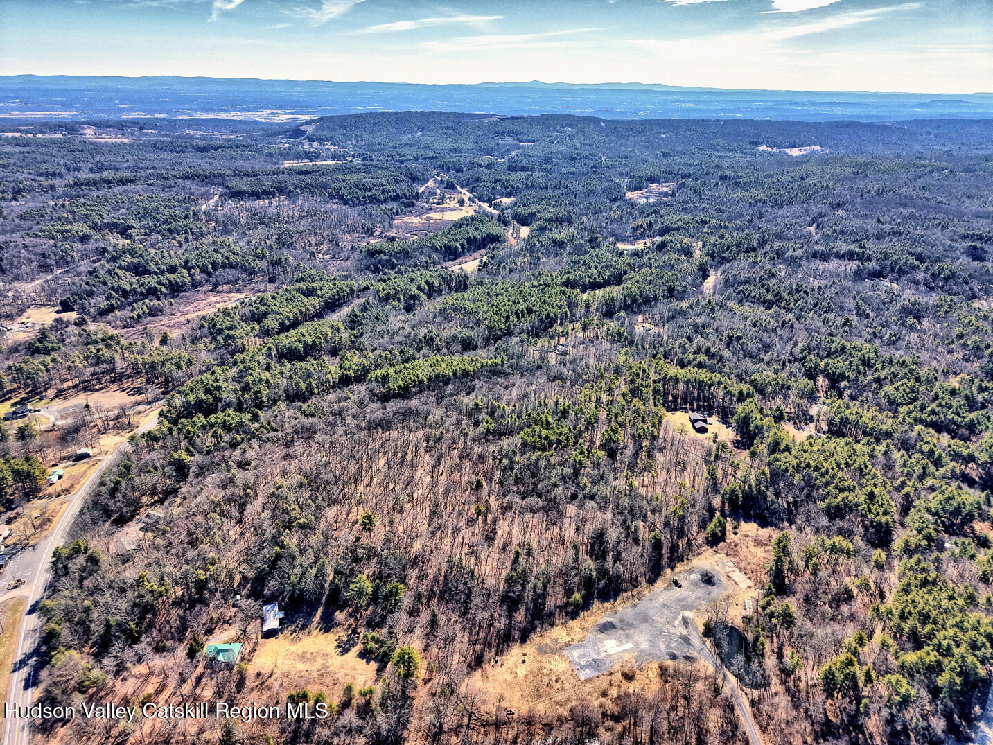 301 Sugar Loaf Road Earlton, NY 12058 - Photo 63 of 64 a view of a city with mountains in the background
