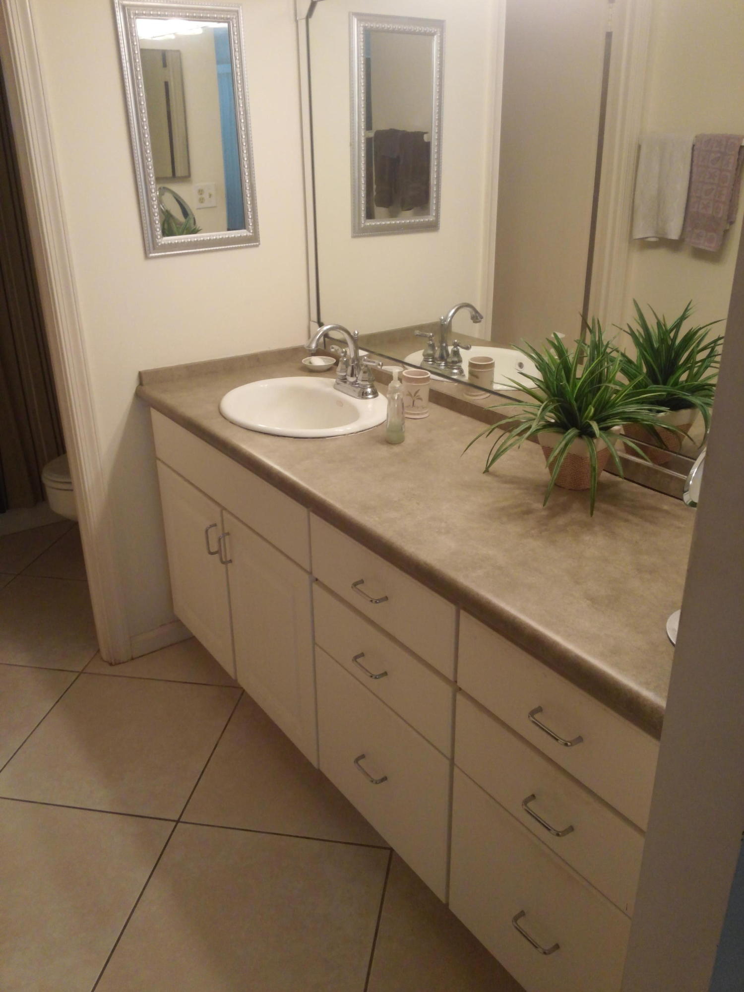 1250 Sugar Sands Boulevard, Unit 110 Riviera Beach, FL 33404 - Photo 11 of 14 Master Bath