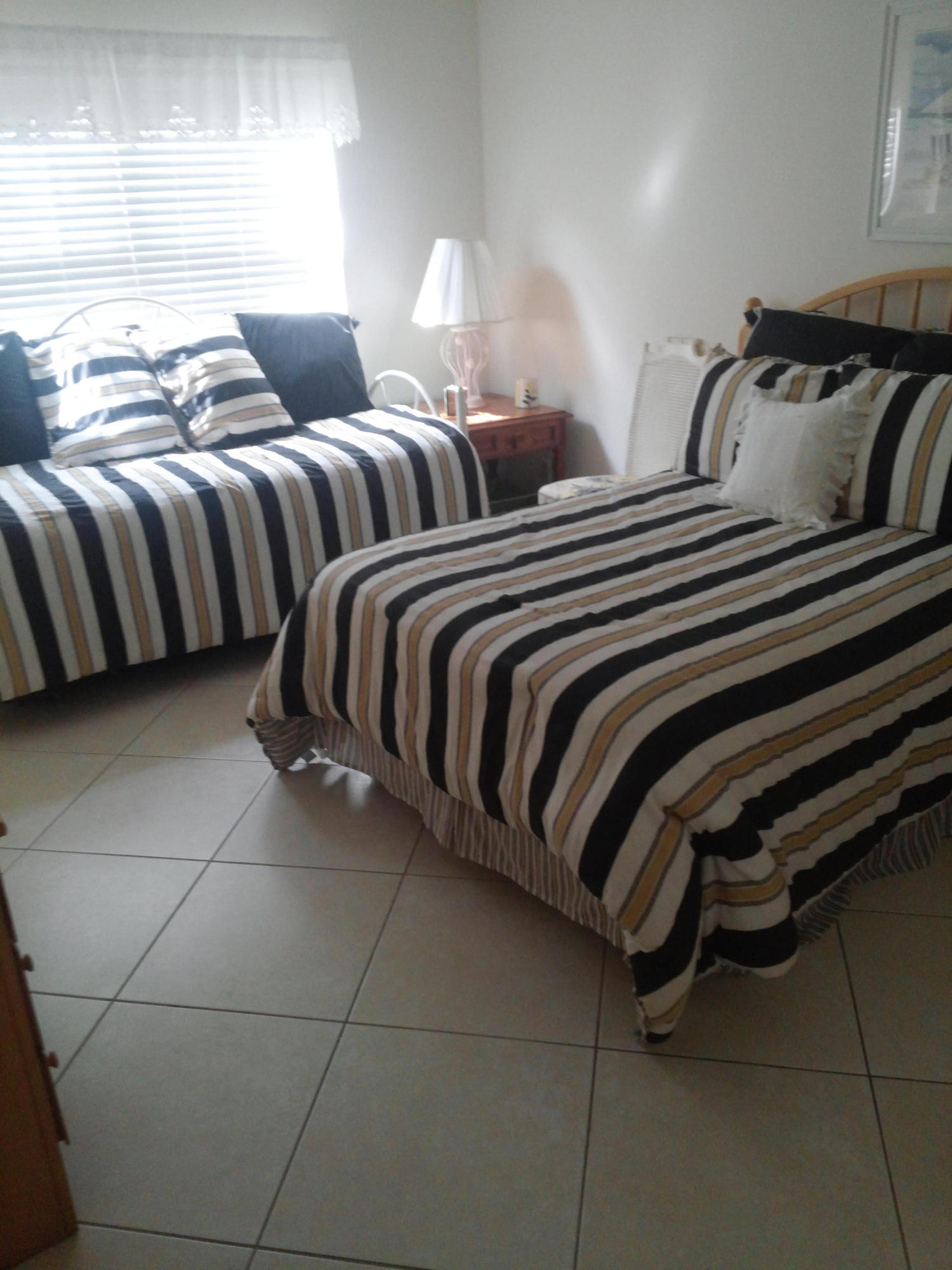 1250 Sugar Sands Boulevard, Unit 110 Riviera Beach, FL 33404 - Photo 12 of 14 Guest Bedroom