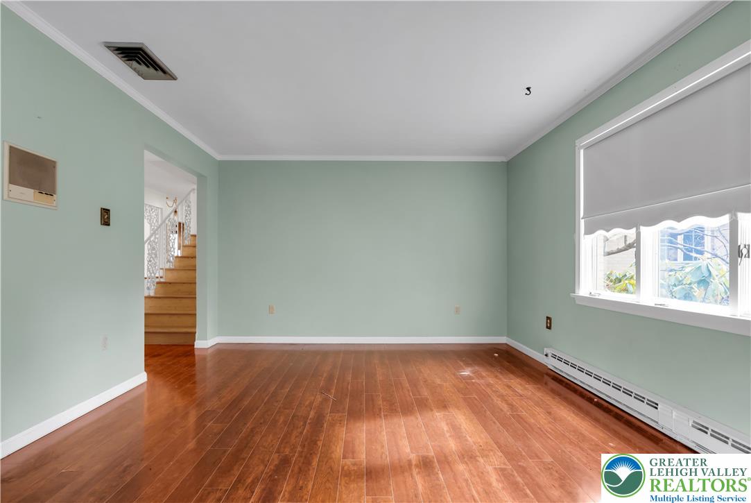 589 North Main Street Luzerne County, PA 18705 - Photo 17 of 53 a view of empty room with wooden floor and fan