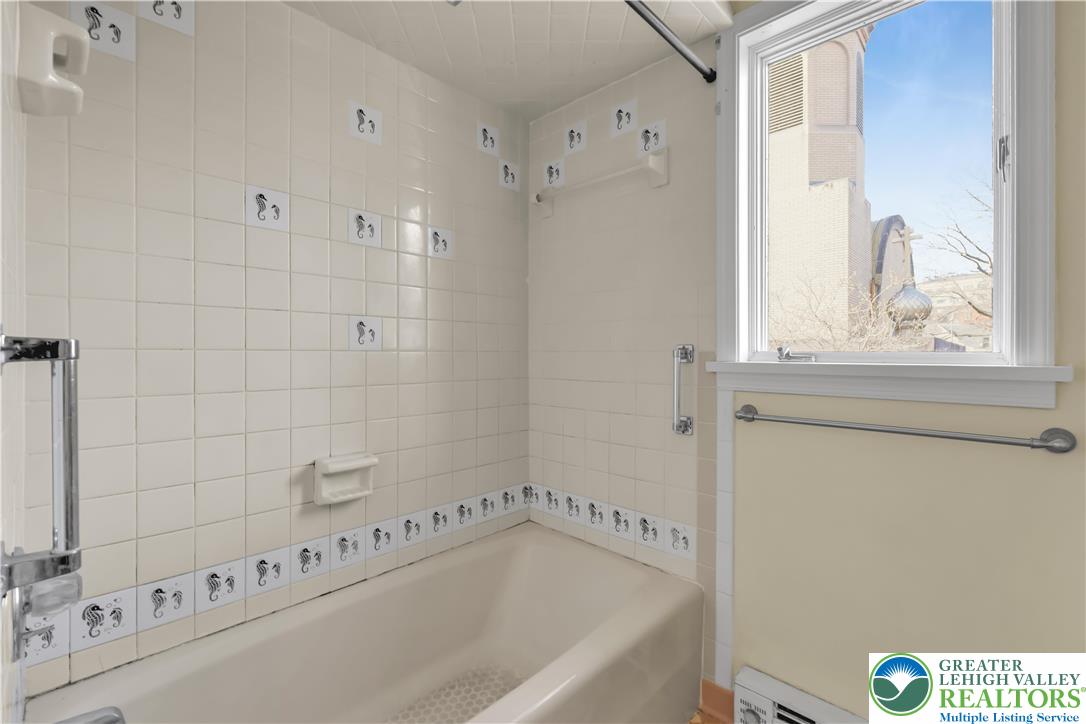 589 North Main Street Luzerne County, PA 18705 - Photo 21 of 53 a bathroom with a bathtub and a shower