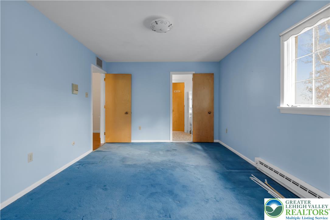 589 North Main Street Luzerne County, PA 18705 - Photo 33 of 53 an empty room with a window and a ceiling fan
