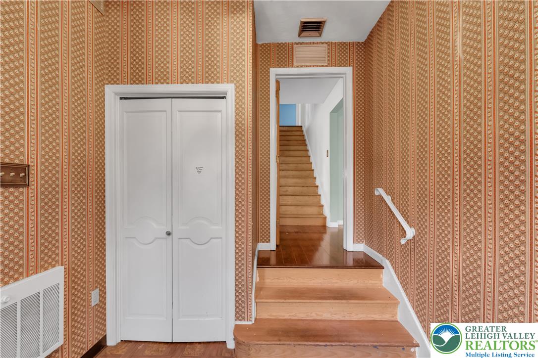 589 North Main Street Luzerne County, PA 18705 - Photo 43 of 53 a view of staircase with white walls and railing