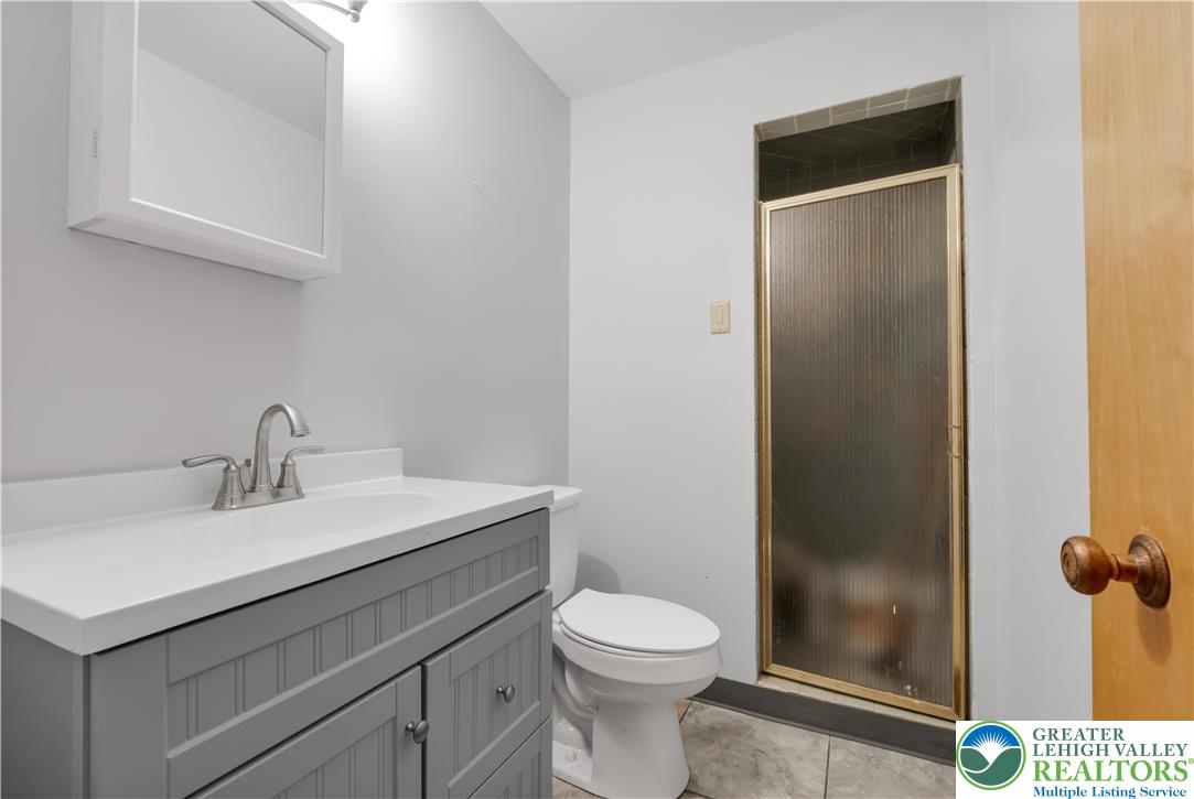 589 North Main Street Luzerne County, PA 18705 - Photo 49 of 53 a bathroom with a sink a toilet and shower