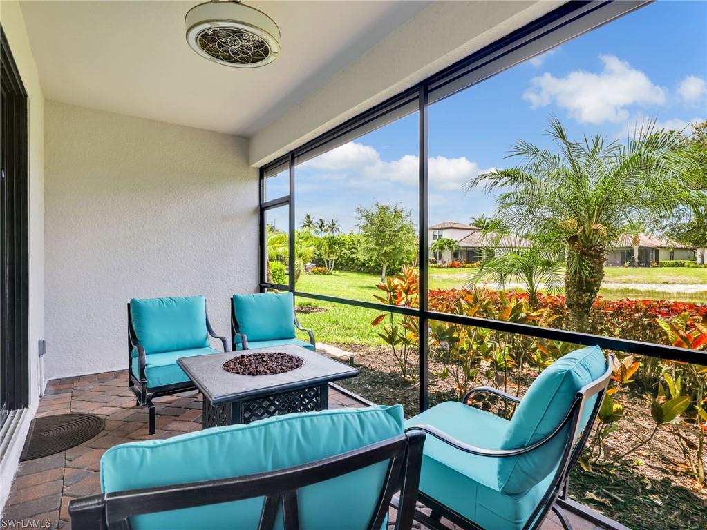 4383 Bismark Way Naples, FL 34119 - Photo 12 of 49 Screened In Lanai with Lake View, Paver Patio, AHT Electric Screen, & Upgraded Landscaping