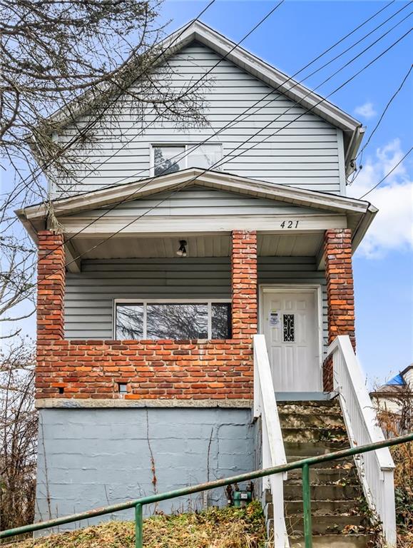 421 High Street McKeesport, PA 15132 - Photo 1 of 23 a view of a two chairs and a window