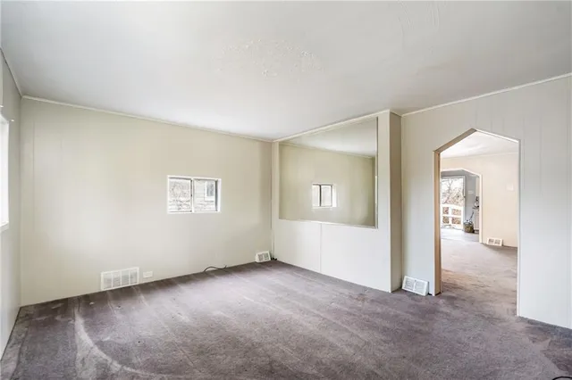 an empty room with windows