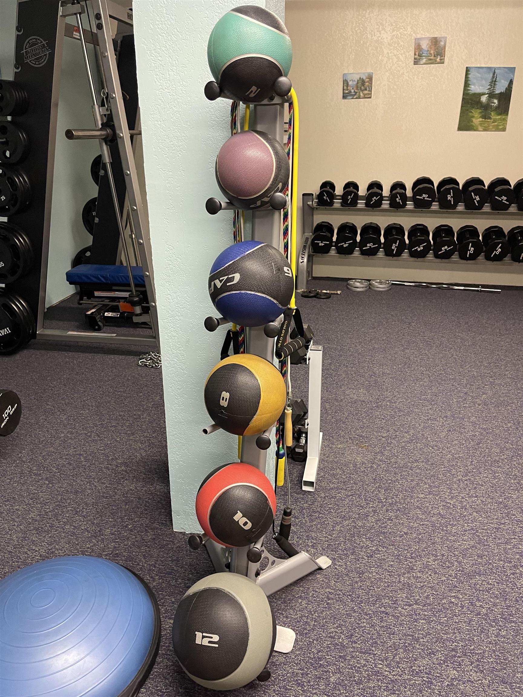 5100 Valley View Drive, Unit 311 Mesa, CO 81643 - Photo 14 of 19 a kitchen with a stove and a wooden floor