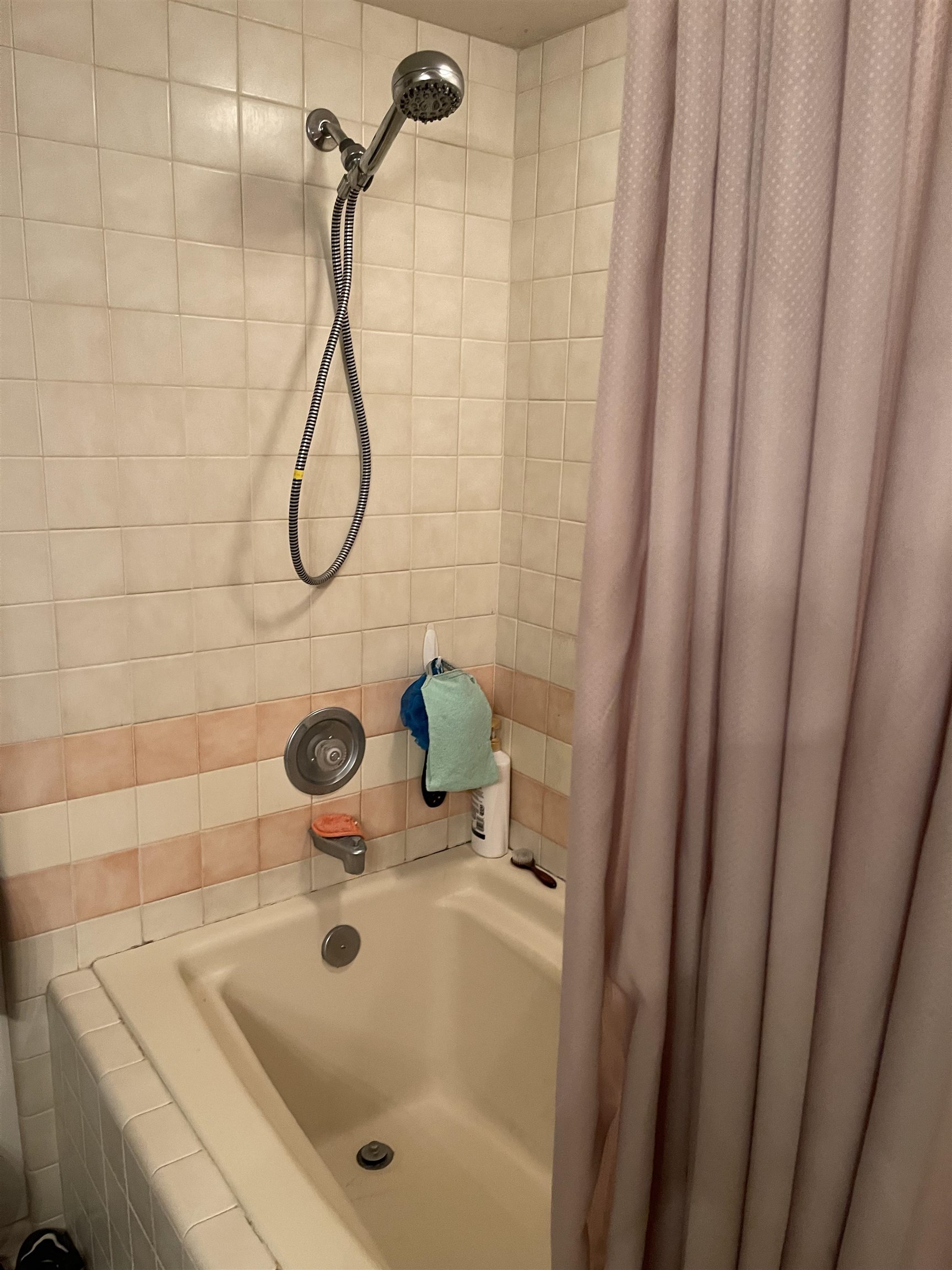 5100 Valley View Drive, Unit 311 Mesa, CO 81643 - Photo 4 of 19 a bathroom with a sink a vanity and shower