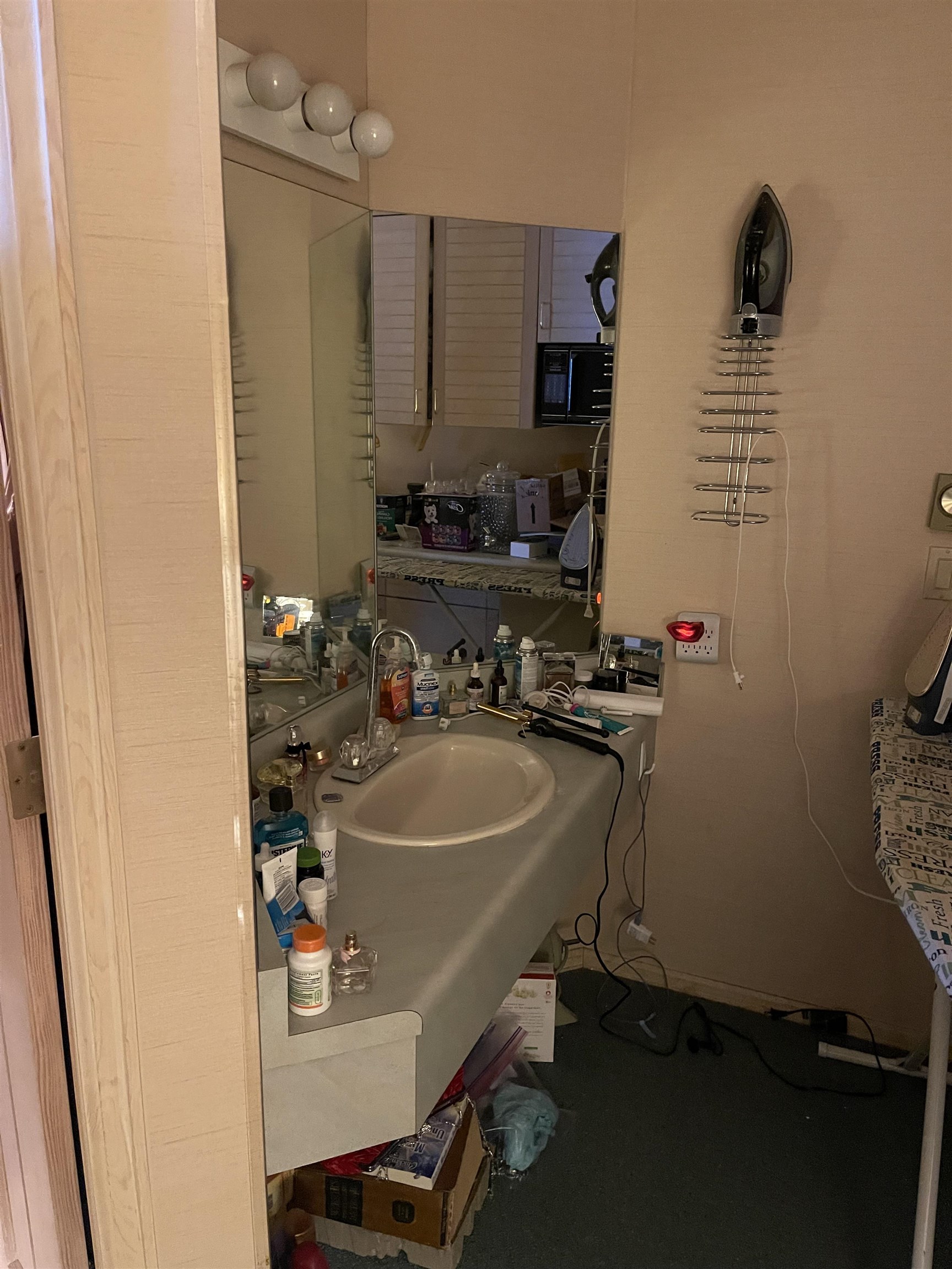 5100 Valley View Drive, Unit 311 Mesa, CO 81643 - Photo 7 of 19 a bathroom with a sink and a mirror