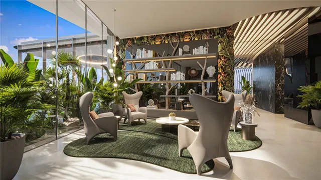 a living room with furniture flowerpot and a potted plant