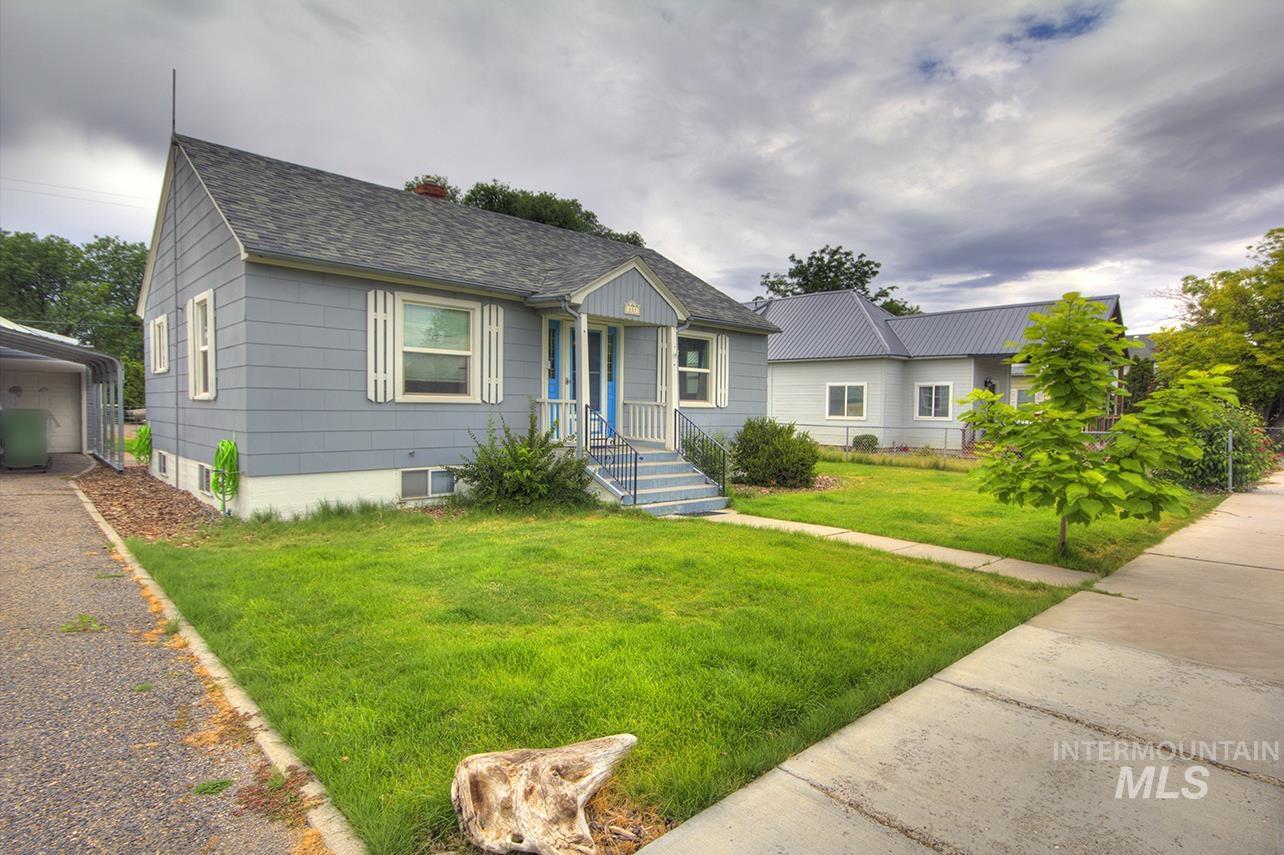 351 West Main Street South Vale, OR 97918 - Photo 32 of 33 Single-story residence featuring light blue siding with white trim, a dark gray shingled roof, and a covered front entry