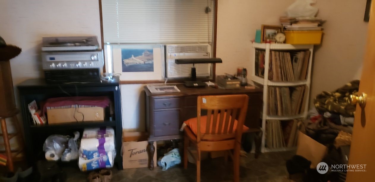520 Willow Drive, Unit 111 Enumclaw, WA 98022 - Photo 13 of 26 a kitchen with stainless steel appliances granite countertop a stove and a refrigerator