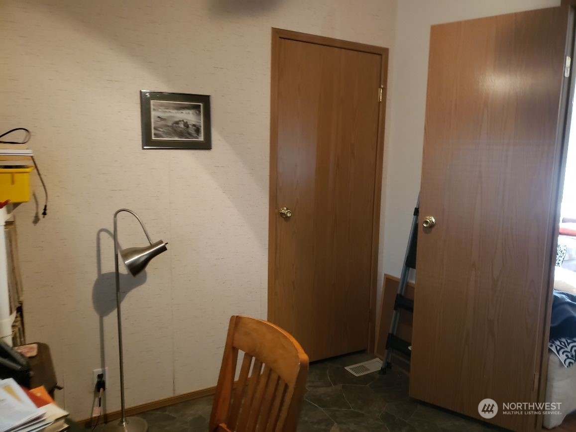 520 Willow Drive, Unit 111 Enumclaw, WA 98022 - Photo 15 of 26 a view of a hallway with a elevator
