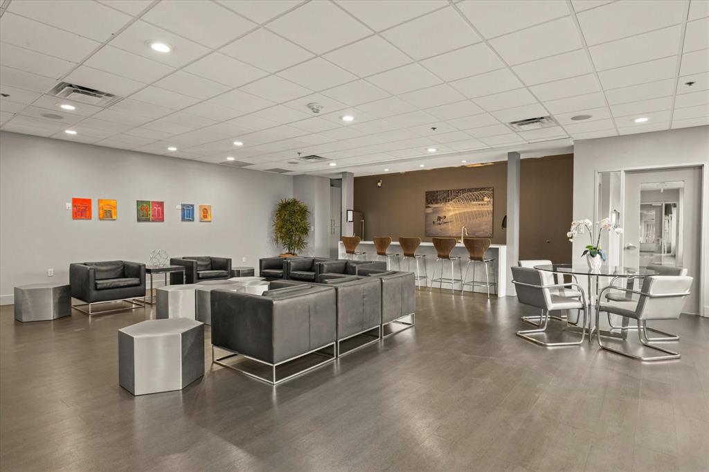 1200 Main Street, Unit 1508 Dallas, TX 75202 - Photo 4 of 16 a living room with furniture a window and chairs