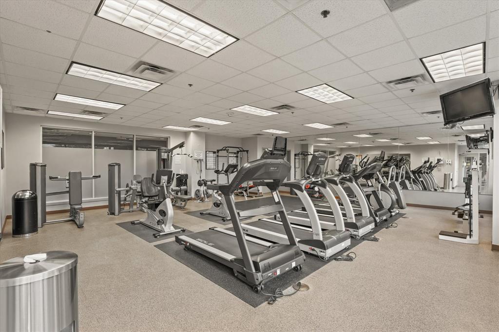 1200 Main Street, Unit 1508 Dallas, TX 75202 - Photo 5 of 16 a view of a room with gym equipment