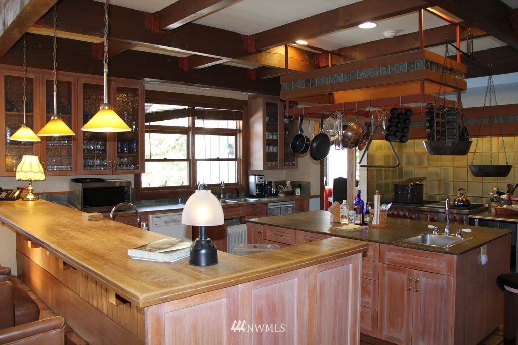 80 Tice Ranch Road Twisp, WA 98856 - Photo 9 of 22 a kitchen with a sink and a stove