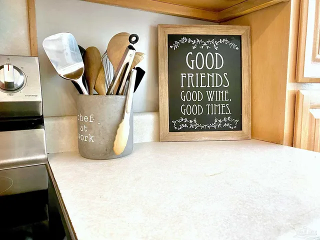 a view of an empty room and with windows