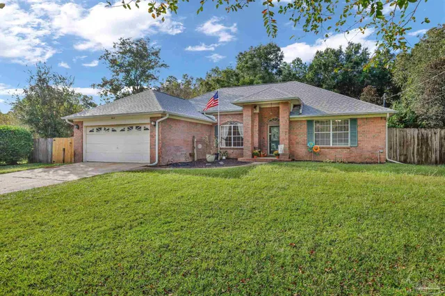 front view of a house with a yard