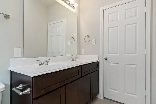 a view of an empty room and closet