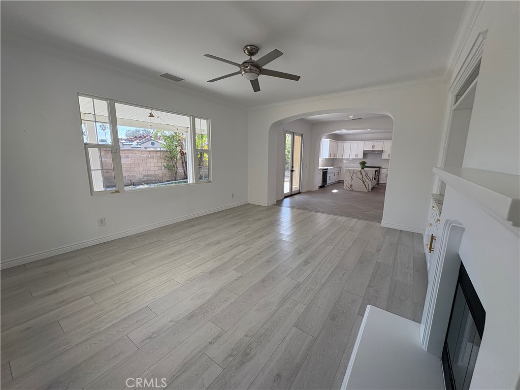 1324 Swan Loop East Upland, CA 91784 - Photo 12 of 27 wooden floor in an empty room with a window