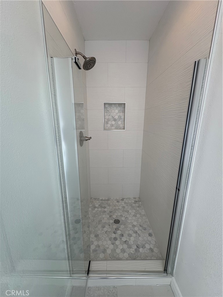 1324 Swan Loop East Upland, CA 91784 - Photo 18 of 27 a bathroom with a shower