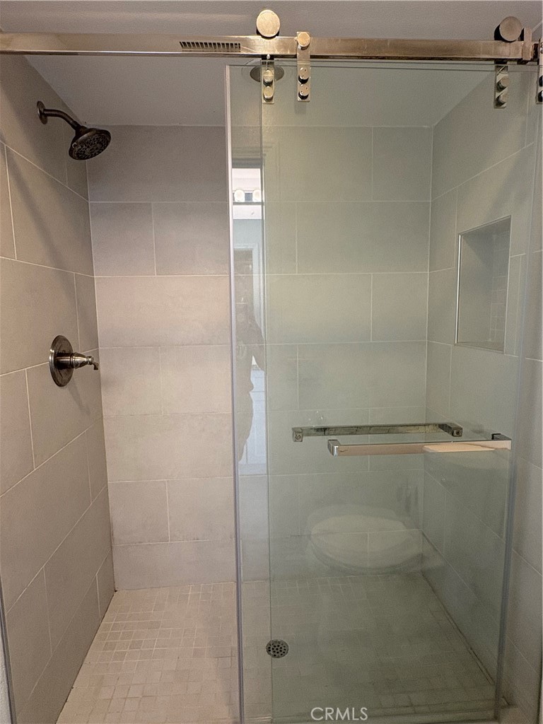 1324 Swan Loop East Upland, CA 91784 - Photo 23 of 27 a bathroom with a shower