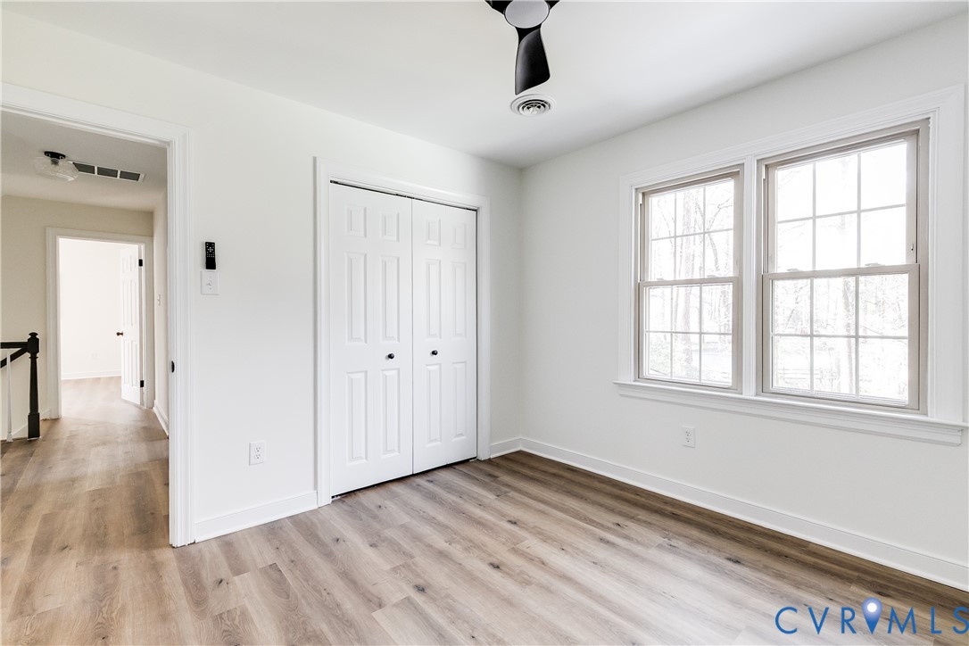 2802 Fairgate Road Midlothian, VA 23112 - Photo 25 of 38 a view of empty room with wooden floor and fan