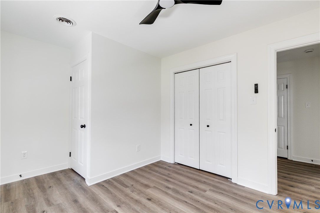 2802 Fairgate Road Midlothian, VA 23112 - Photo 29 of 38 a view of an empty room with wooden floor