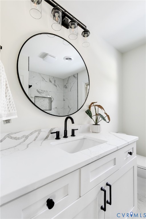 2802 Fairgate Road Midlothian, VA 23112 - Photo 30 of 38 a bathroom with a sink and mirror