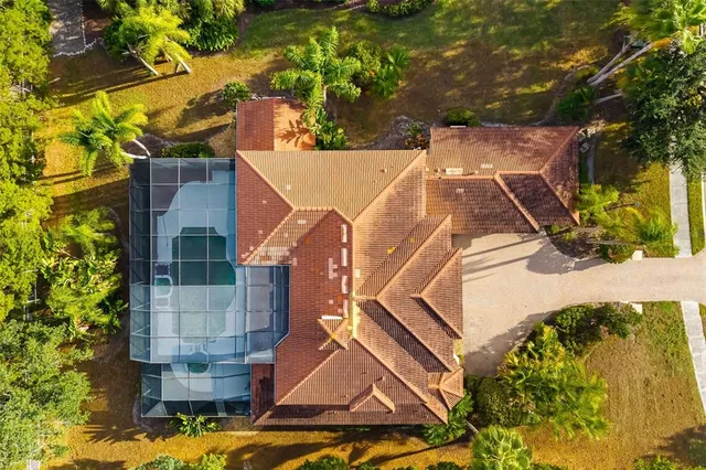 a spacious bathroom with a bathtub and next to a window