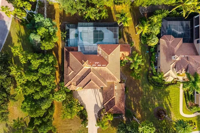a kitchen with stainless steel appliances granite countertop a refrigerator sink and cabinets