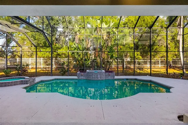 a kitchen with cabinets and stainless steel appliances