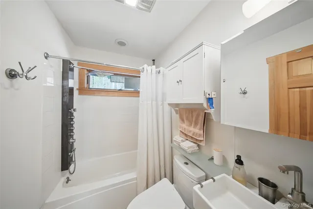 a view of balcony with wooden floor