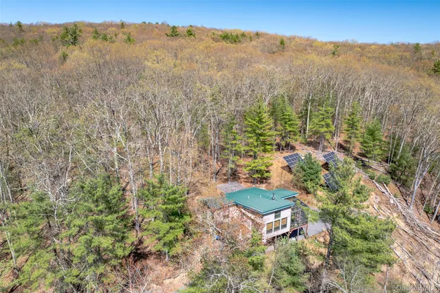 an aerial view of residential house and space