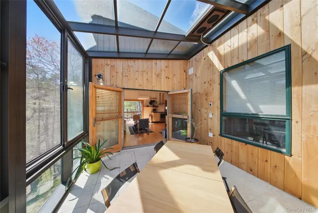 a kitchen with stainless steel appliances kitchen island granite countertop a refrigerator and a stove