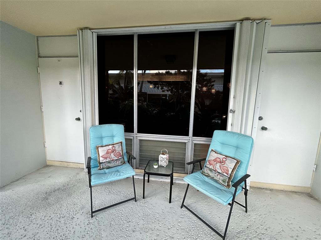4630 Poinciana Street, Unit 1C Lauderdale-by-the-Sea, FL 33308 - Photo 3 of 7 a living room with furniture