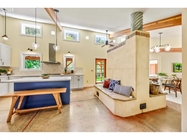 a living room with furniture and a table