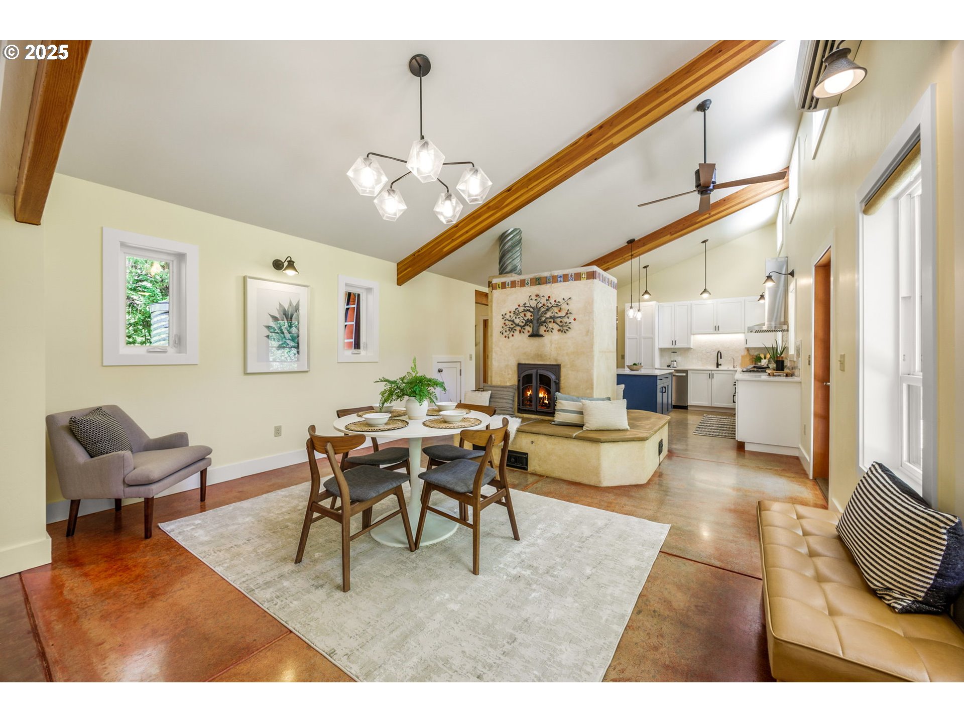 1848 Anderson Creek Road Talent, OR 97540 - Photo 26 of 48 a living room with furniture a chandelier and a dining table