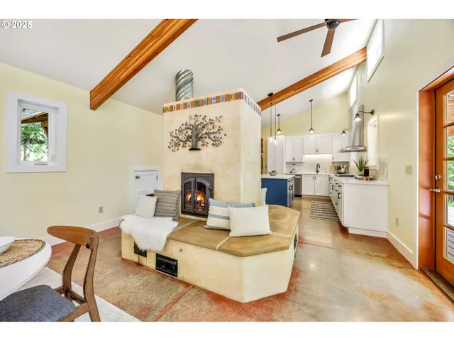 a living room with furniture and a table