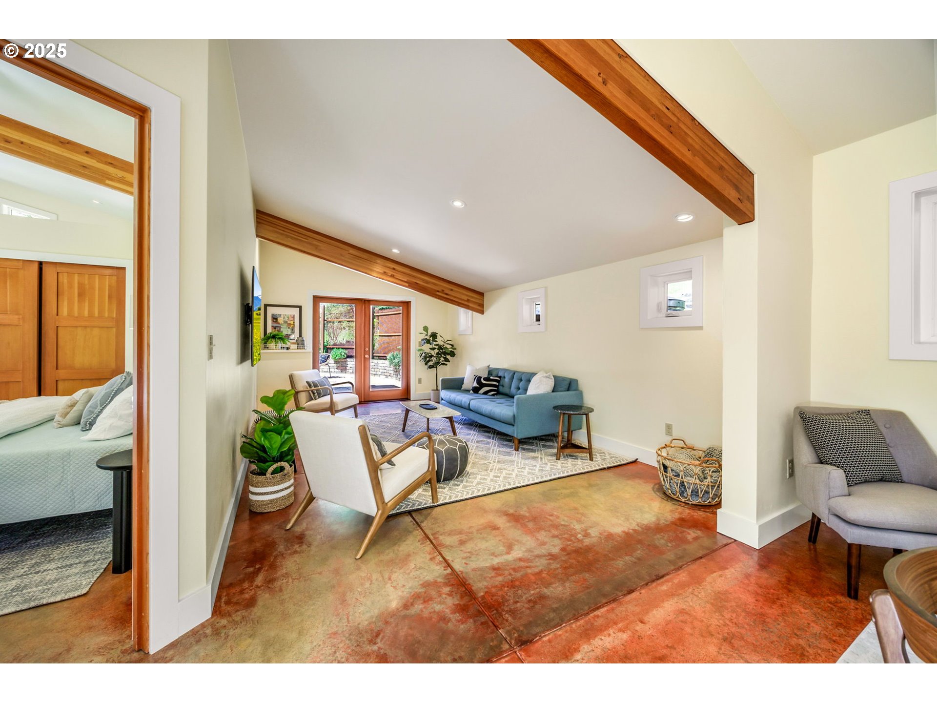1848 Anderson Creek Road Talent, OR 97540 - Photo 28 of 48 a living room with furniture and a floor to ceiling window