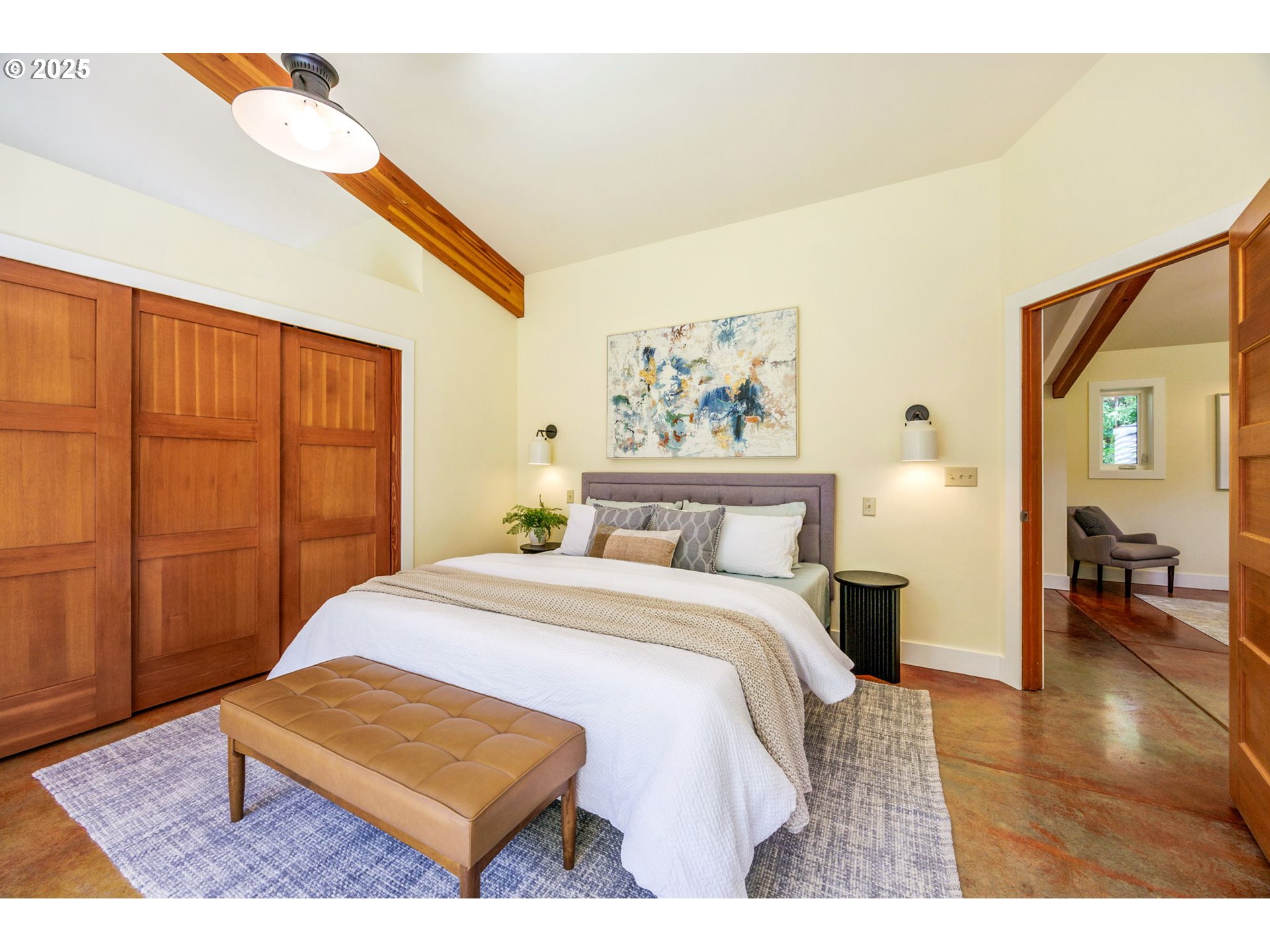 1848 Anderson Creek Road Talent, OR 97540 - Photo 35 of 48 a bedroom with a bed and a painting on the wall