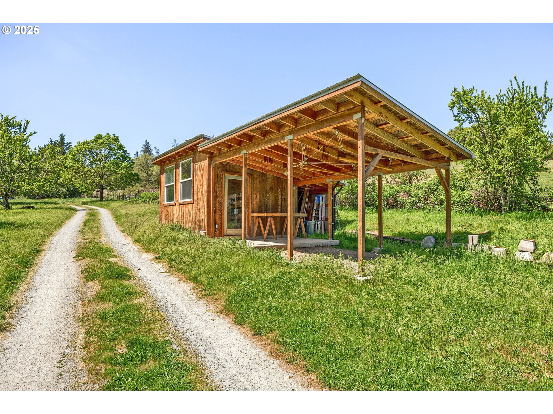 1848 Anderson Creek Road Talent, OR 97540 - Photo 47 of 48 a view of a house with backyard and porch