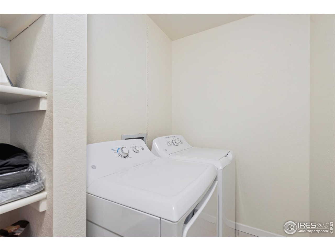 1440 Edora Road, Unit 13 Fort Collins, CO 80525 - Photo 18 of 20 Large laundry room on the same level as the bedrooms. Washer and dryer stay!