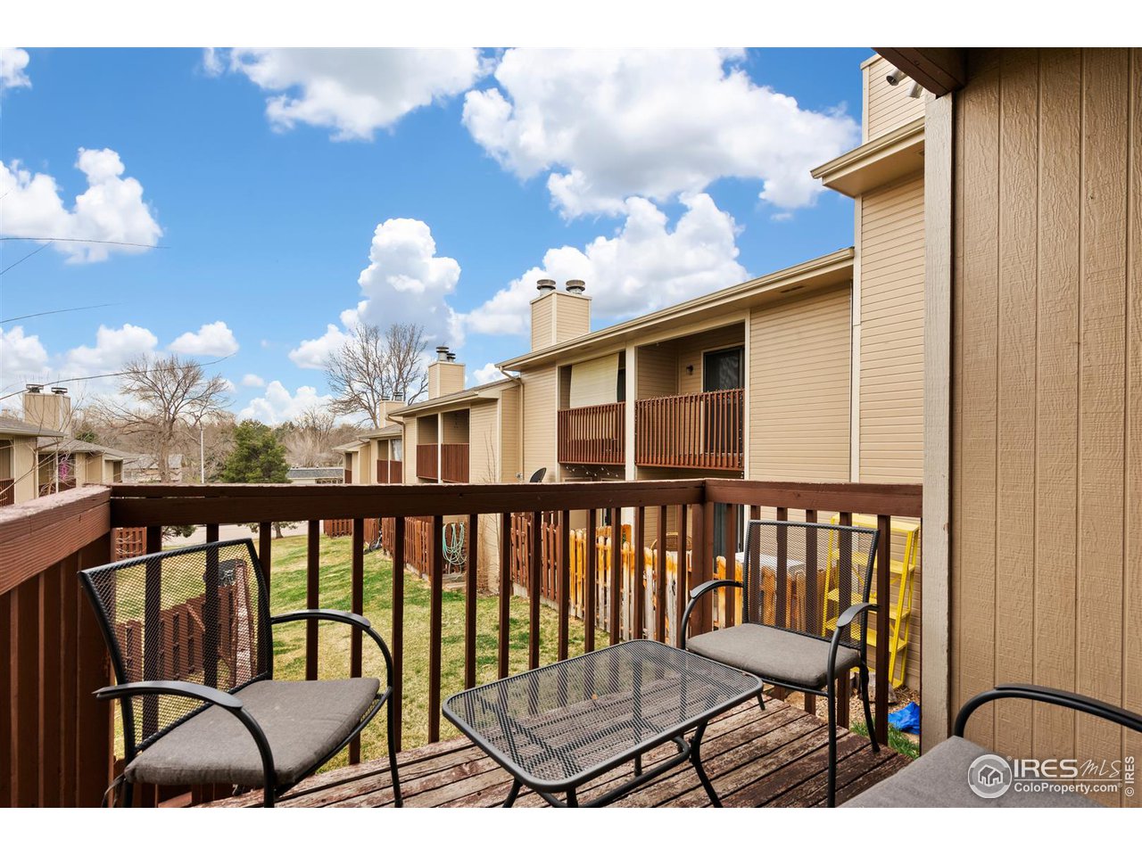 1440 Edora Road, Unit 13 Fort Collins, CO 80525 - Photo 6 of 20 Multiple outdoor living spaces! Deck overlooks open space with views toward Edora Park.