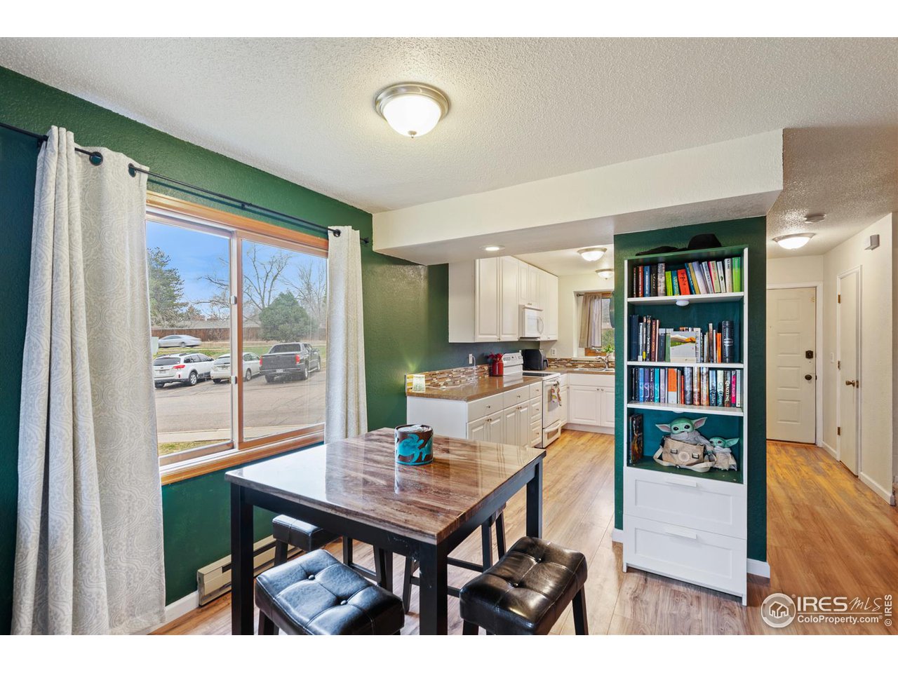 1440 Edora Road, Unit 13 Fort Collins, CO 80525 - Photo 7 of 20 Luxury vinyl plank flooring throughout the main level