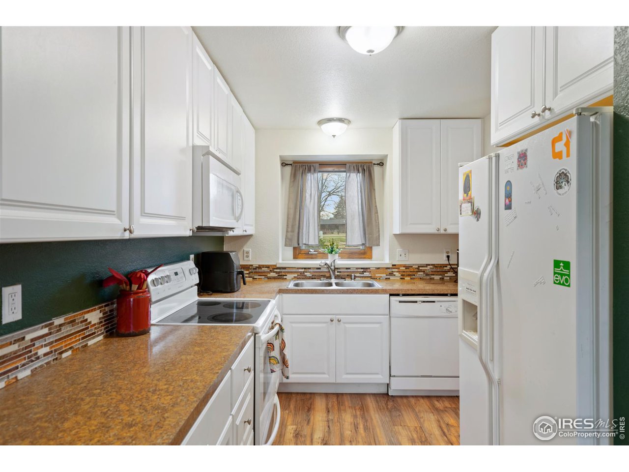 1440 Edora Road, Unit 13 Fort Collins, CO 80525 - Photo 9 of 20 Fresh, updated kitchen
