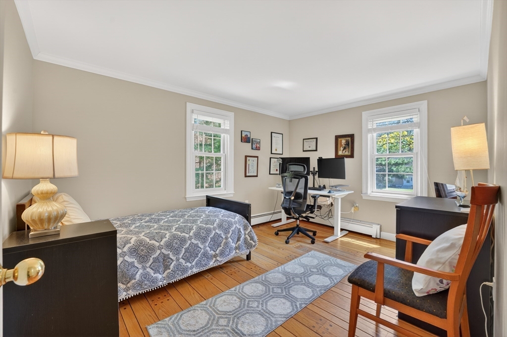 71 Robert Best Road Sudbury, MA 01776 - Photo 15 of 31 a bedroom with furniture and a window